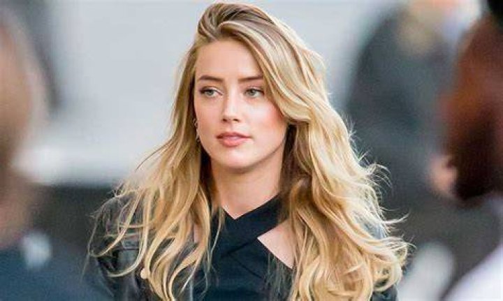 Has Amber Heard been dropped from L'Oreal? 1 AMBERR 1
