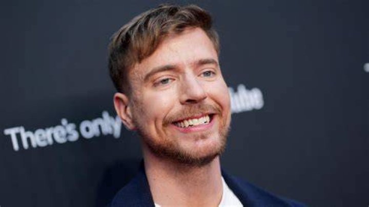MrBeast is posing on the red carpet will fellow YouTubers.